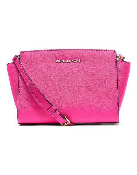 michael kors light pink messenger bag leather last season|Michael Kors mini handbags.